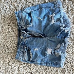 distressed blue denim shorts